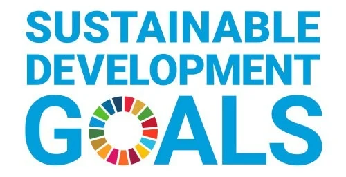 sustainable-development-goals The image displays the phrase "Sustainable Development Goals" in blue text with a colorful circular emblem representing sustainability. The emblem illustrates the importance of vibrant, sustainable practices for a healthy, nourishing future.| Daré Vita Café | Las Vegas