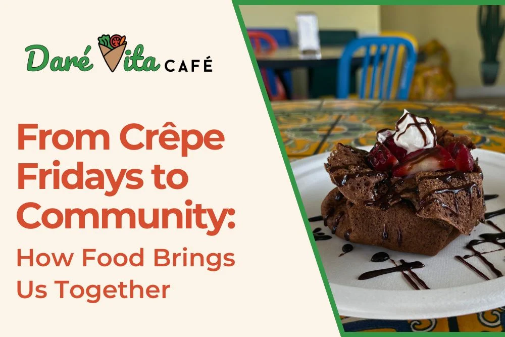 A vibrant, allergen-friendly chocolate crepe topped with fresh strawberries and whipped cream, drizzled with chocolate sauce, sits on a colorful table in a cozy café setting, promoting community through nourishing, healthy living.| Daré Vita Café | Las Vegas